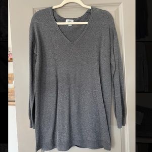Grey long sleeve sweater, longer in length